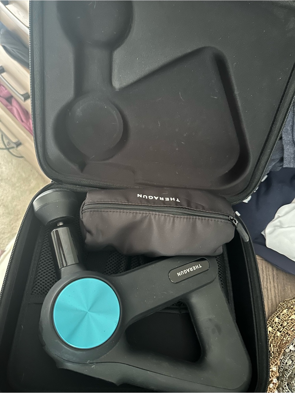 THERAGUN Elite Percussive Massage Device - Black with Teal Accent